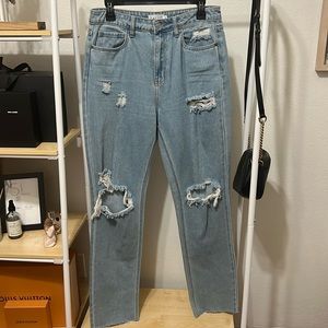 Distress denim jeans only wore once! In great condition